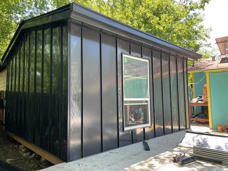 Black standing seam metal wall panels for Roof Inspection in North Whitehall