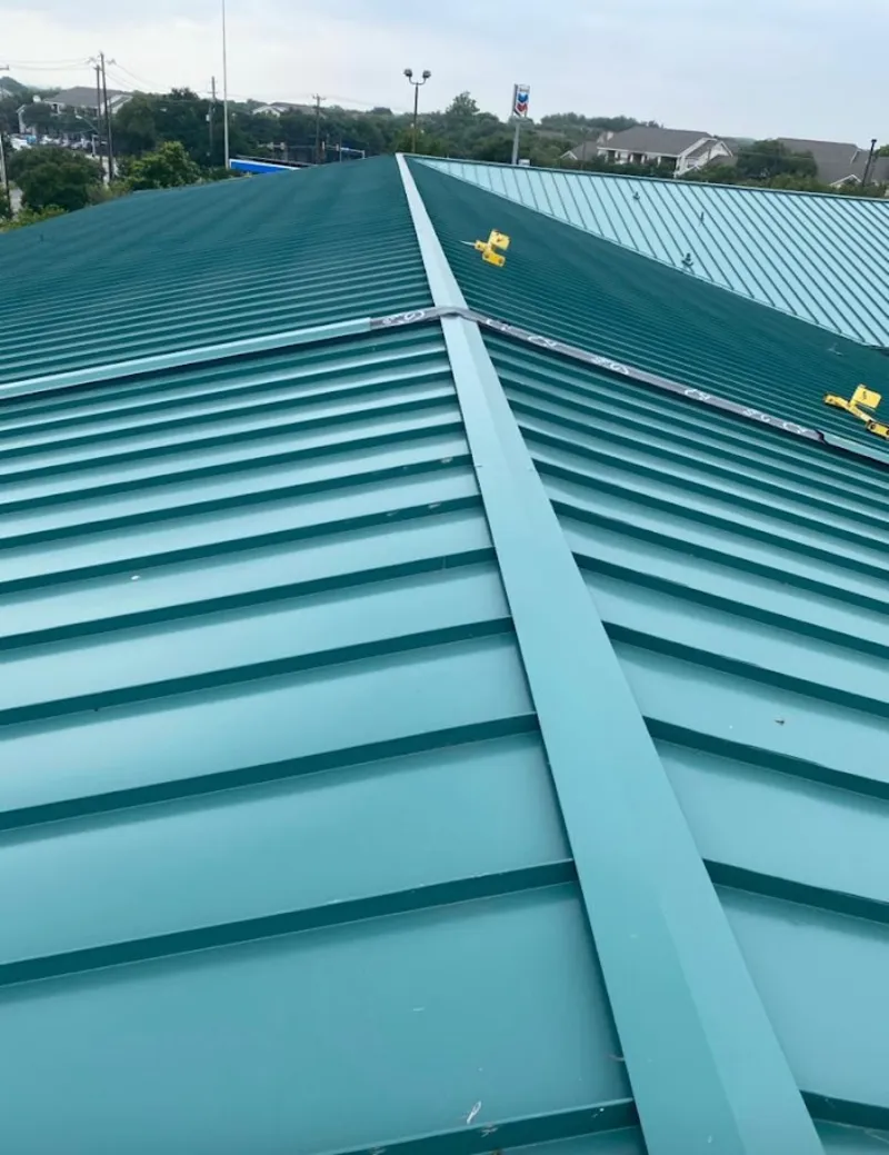 Green commercial metal roof ridge and valley for Metal Roof Repair in North Whitehall